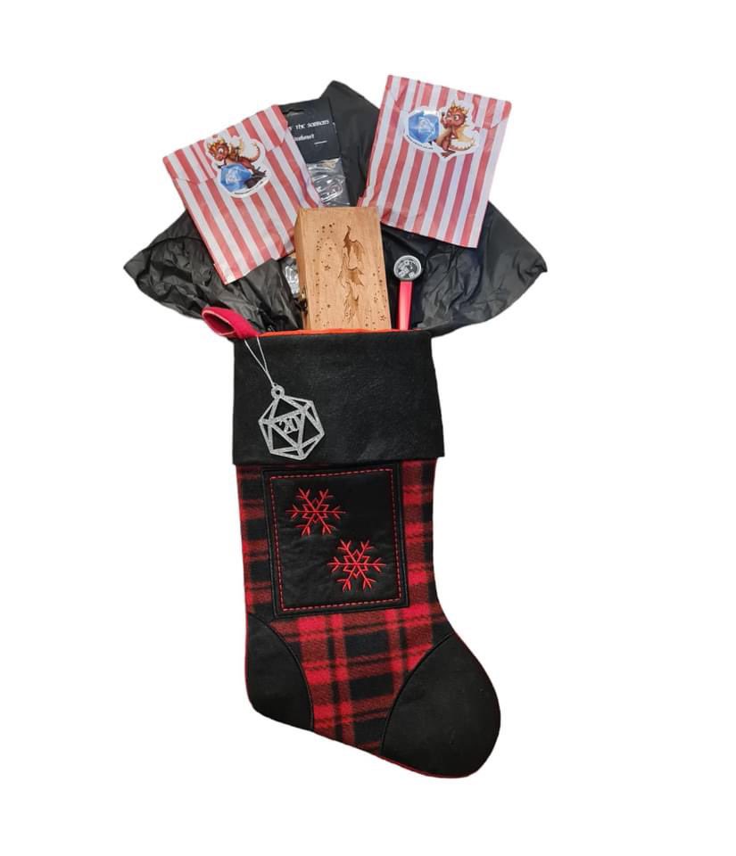 The wait is over! The 2024 Loot Stocking is now available in limited quantities. It includes at least three sets of dice, with a guarantee of one metal set! They tend to sell out quickly, so secure yours today! 😀🎄