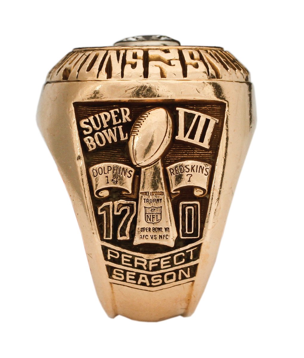 PhinsChris's tweet photo. Only one team has a ring that says “Perfect Season” on it. 

Population: 1 https://t.co/Ntz1a4tj1O