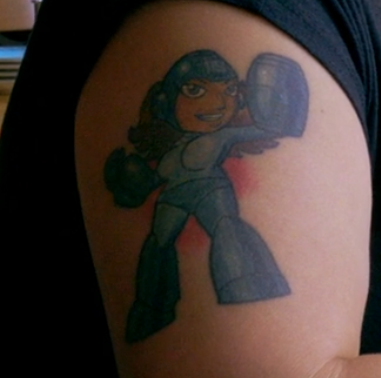 Mega Man tattoo in ¡Casa Bonita Mi Amor!
