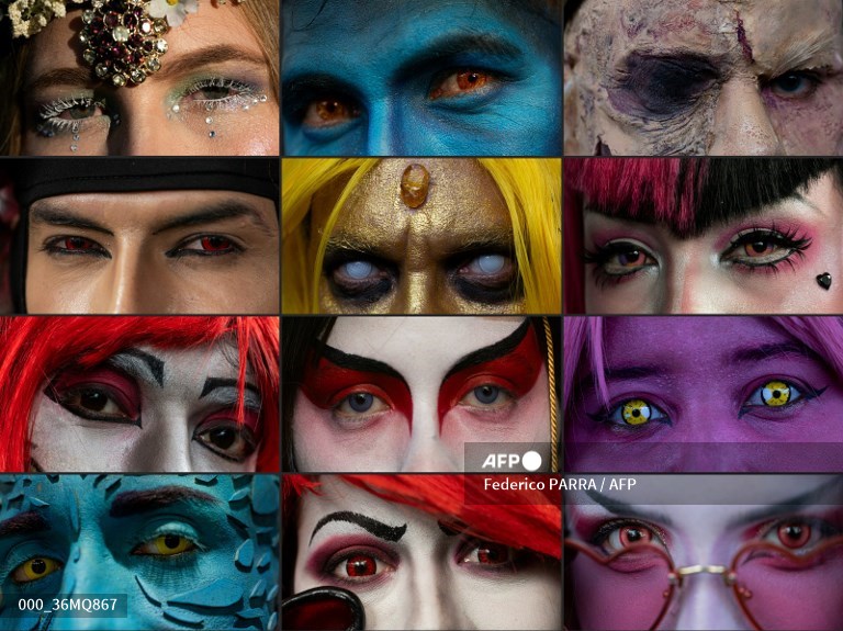 (COMBO) This combination of pictures created on November 17, 2024 shows the eyes of cosplayers posing inside a convention center during the Comic Con in Caracas on November 17, 2024. <a href="/federicoparra/">Federico Parra</a>  / <a href="/AFPphoto/">AFP Photo</a>