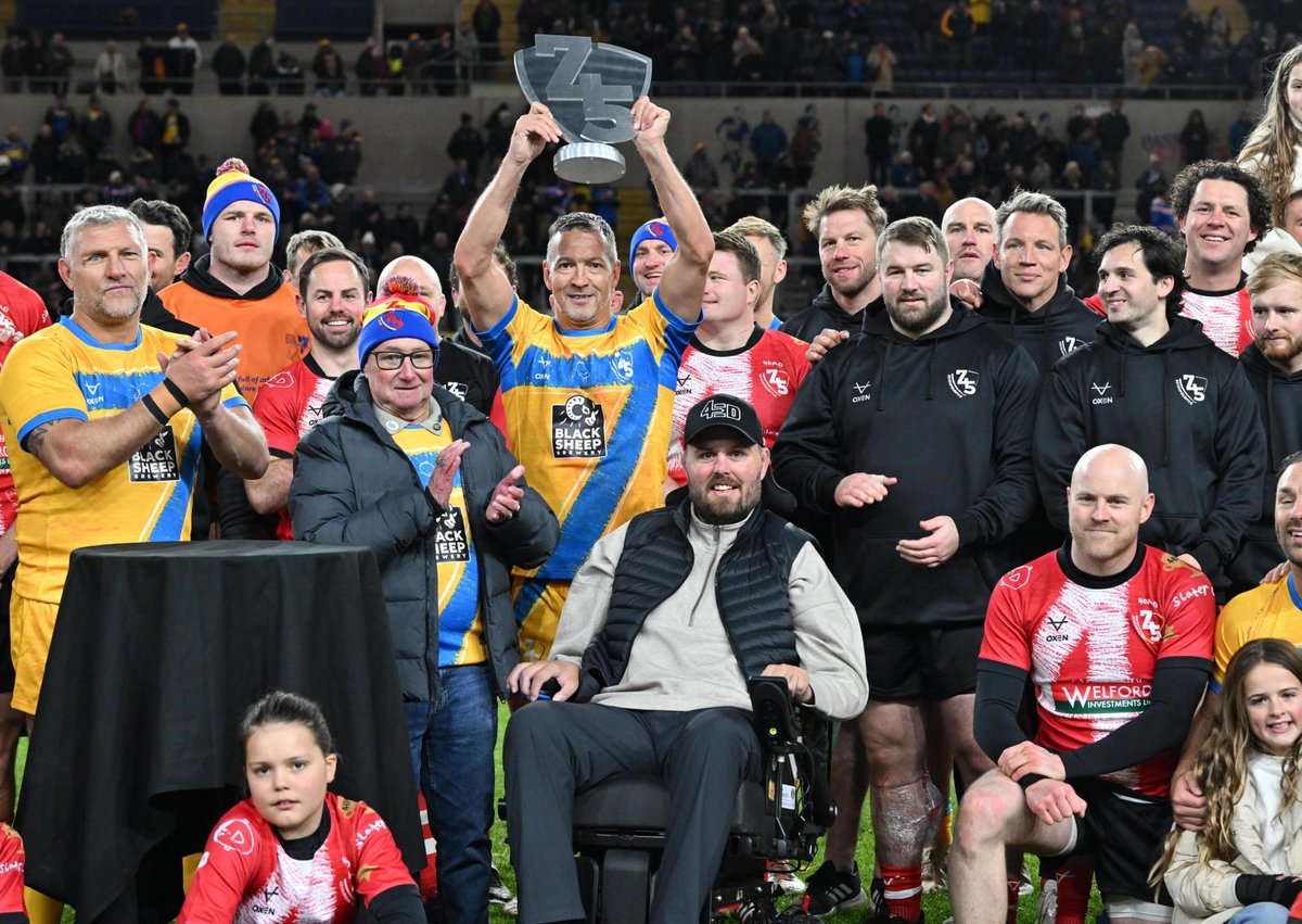 🏆 Danny McGuire lifts the trophy as captain of Team Burrow in the first ever 745 Cross Code game.