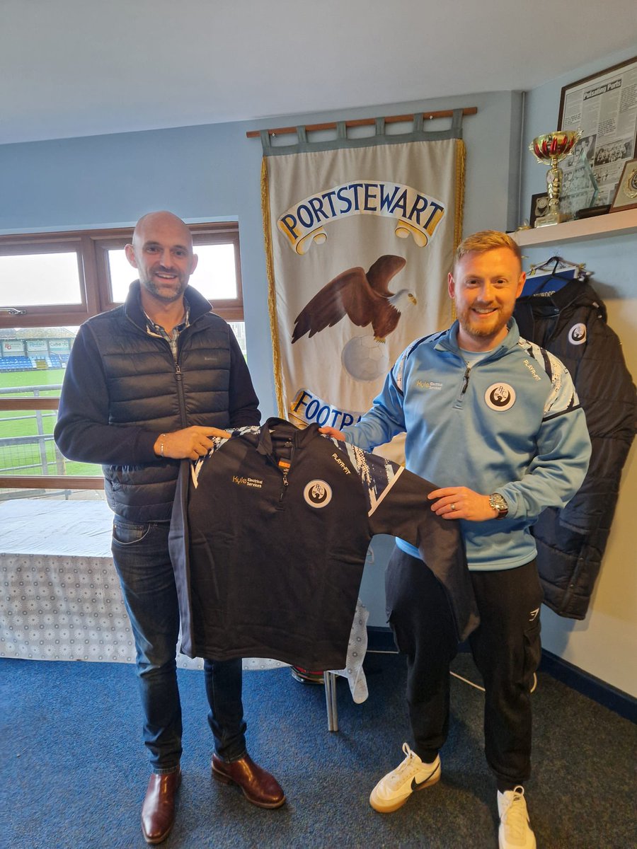 PortstewartFC's tweet photo. Reserves focus 

We would like to thank Allister Kyle of Kyle Electrical Services for his sponsorship of our reserves Playr-Fit 1/4 Zip tops. 

(Pictured is Allister Kyle with Reserve team player Steven Miller) https://t.co/aORiwakCRo