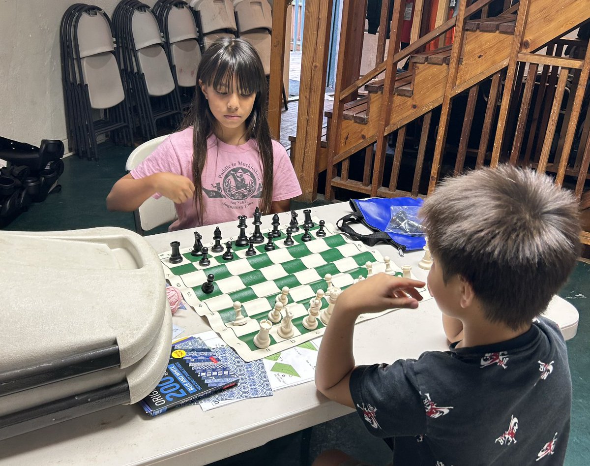 NVSchools's tweet photo. Everson Elementary third-grade teacher Eli Davis spends Thursday afternoons helping at a chess club at the Nooksack Indian Tribe’s Timber Ridge Center. Davis helps build connections between Everson Elementary and the students at staff at Timber Ridge. https://t.co/kuMs5GGqo5