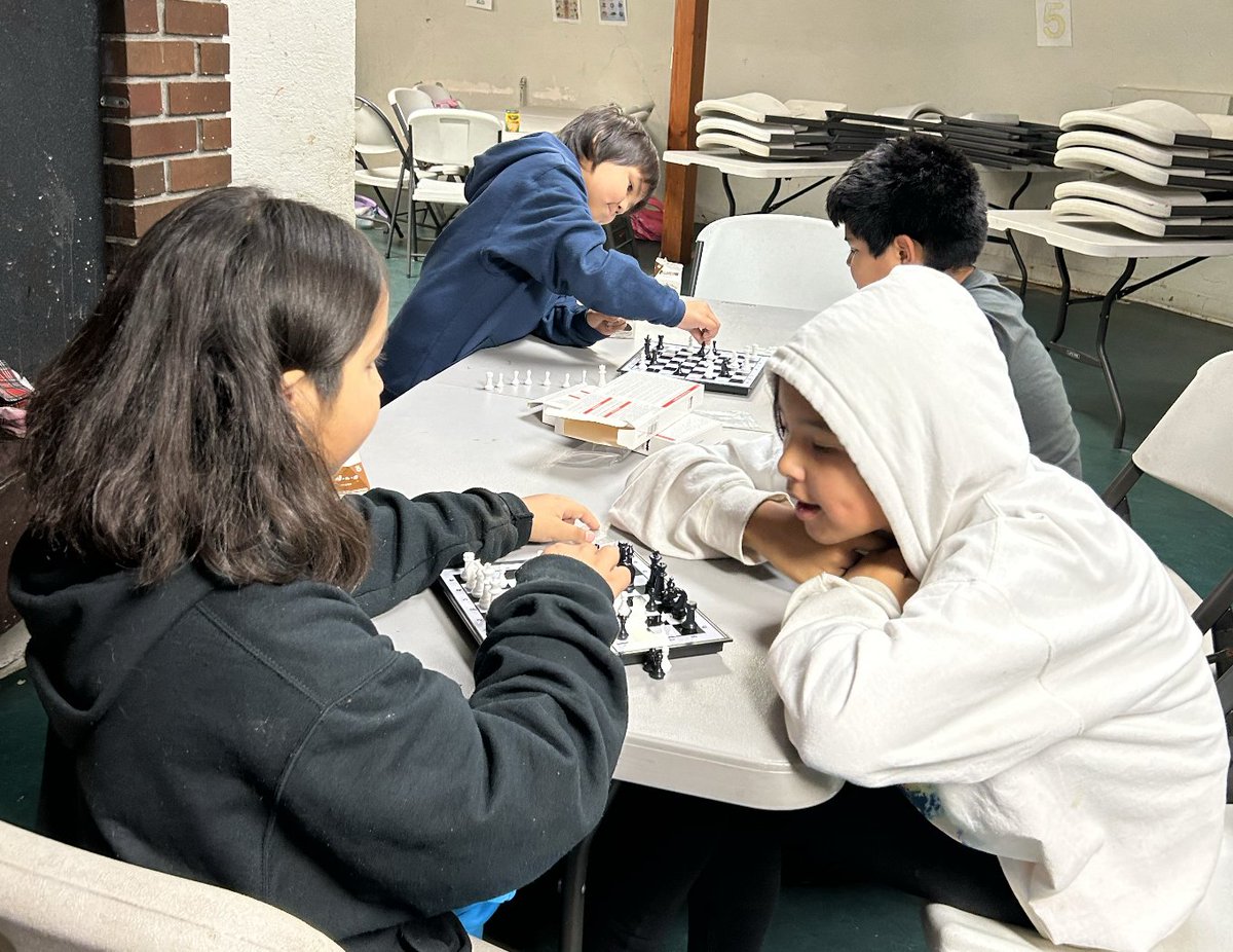 NVSchools's tweet photo. Everson Elementary third-grade teacher Eli Davis spends Thursday afternoons helping at a chess club at the Nooksack Indian Tribe’s Timber Ridge Center. Davis helps build connections between Everson Elementary and the students at staff at Timber Ridge. https://t.co/kuMs5GGqo5