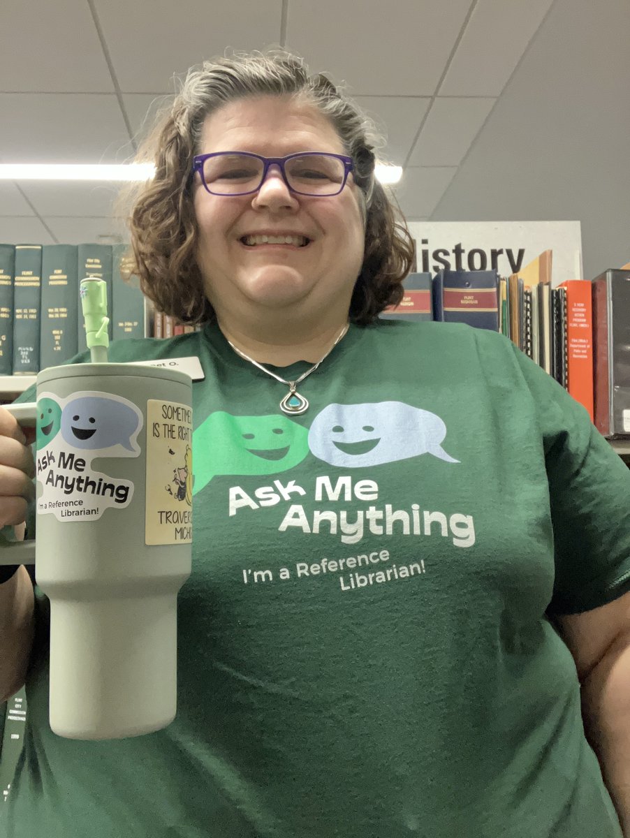 RUSA member @gianettaduja rocking her "Ask Me Anything I am a Reference Librarian" shirt and stickers. Grab yours today at alagraphics-gift-shop.myspreadshop.com/rusa?fbclid=Iw…