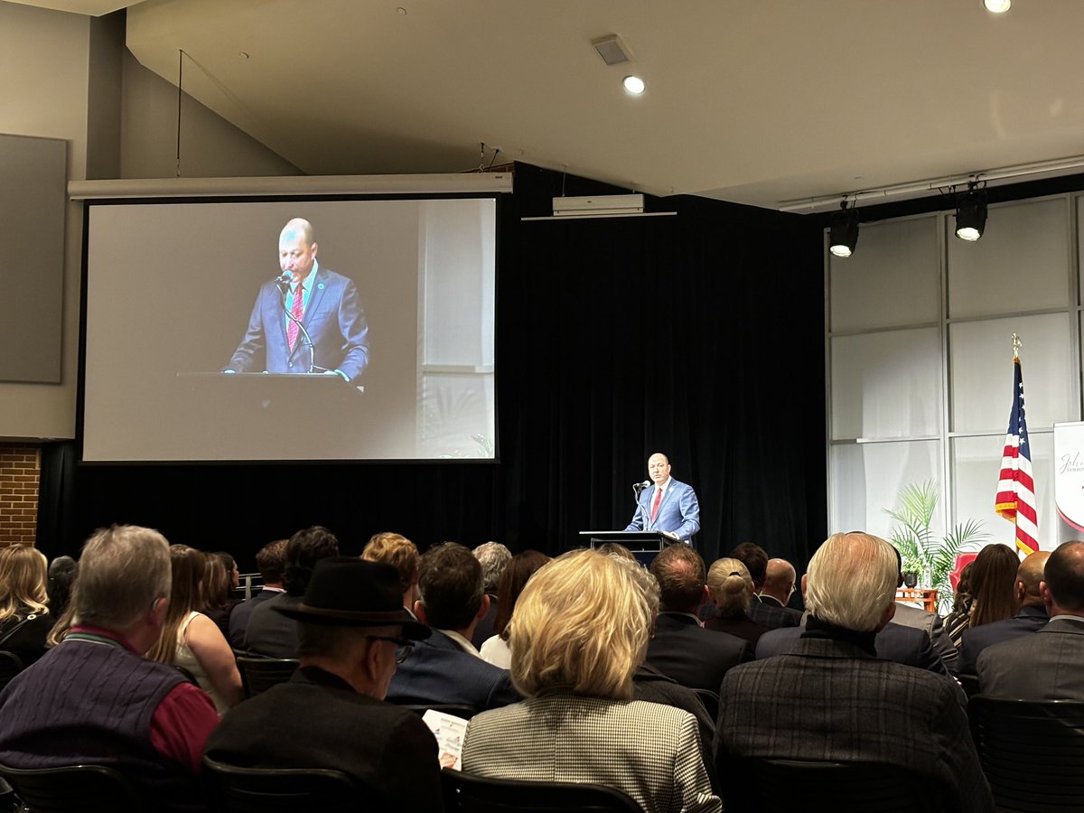 bluestein's tweet photo. Georgia Attorney General Chris Carr opens the Johnny Isakson Symposium on Political Civility with a reminder of the late U.S. senator’s mantra: “There are only two kinds of people in the world — friends and future friends.” #gapol https://t.co/ilEzyrS98O