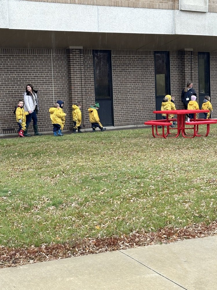 Our youngest scholars in the Outdoor Adventures Program are dressed for learning. They won't let a little rain stop them.