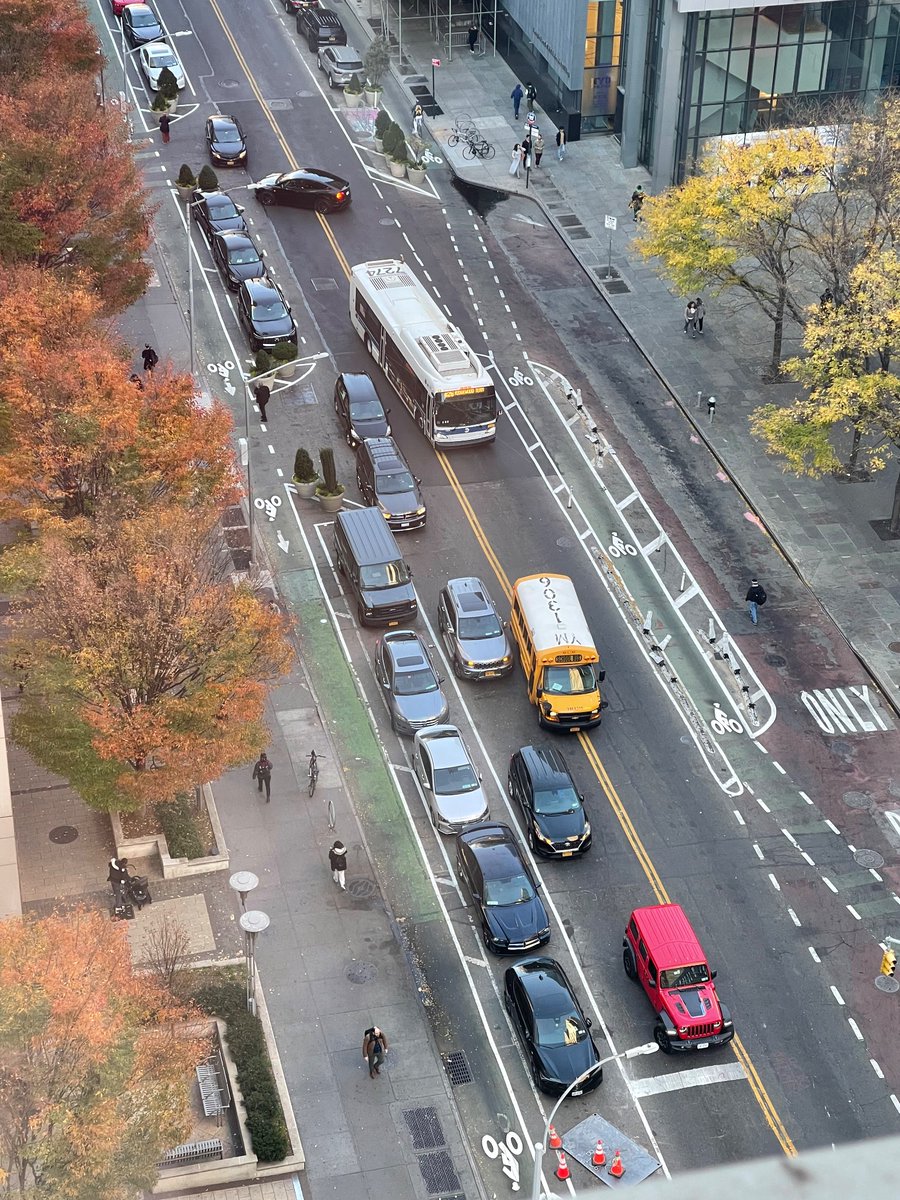 A good thing about putting the bike lane next to the curb is that double-parked cars no longer block it.