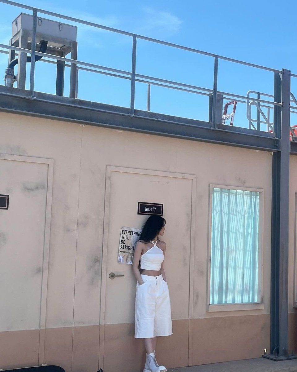 Leaning against the world’s quiet reassurance, I find solace in the simplicity of the sunlit walls, the breeze, and the thought that “everything will be alright.”