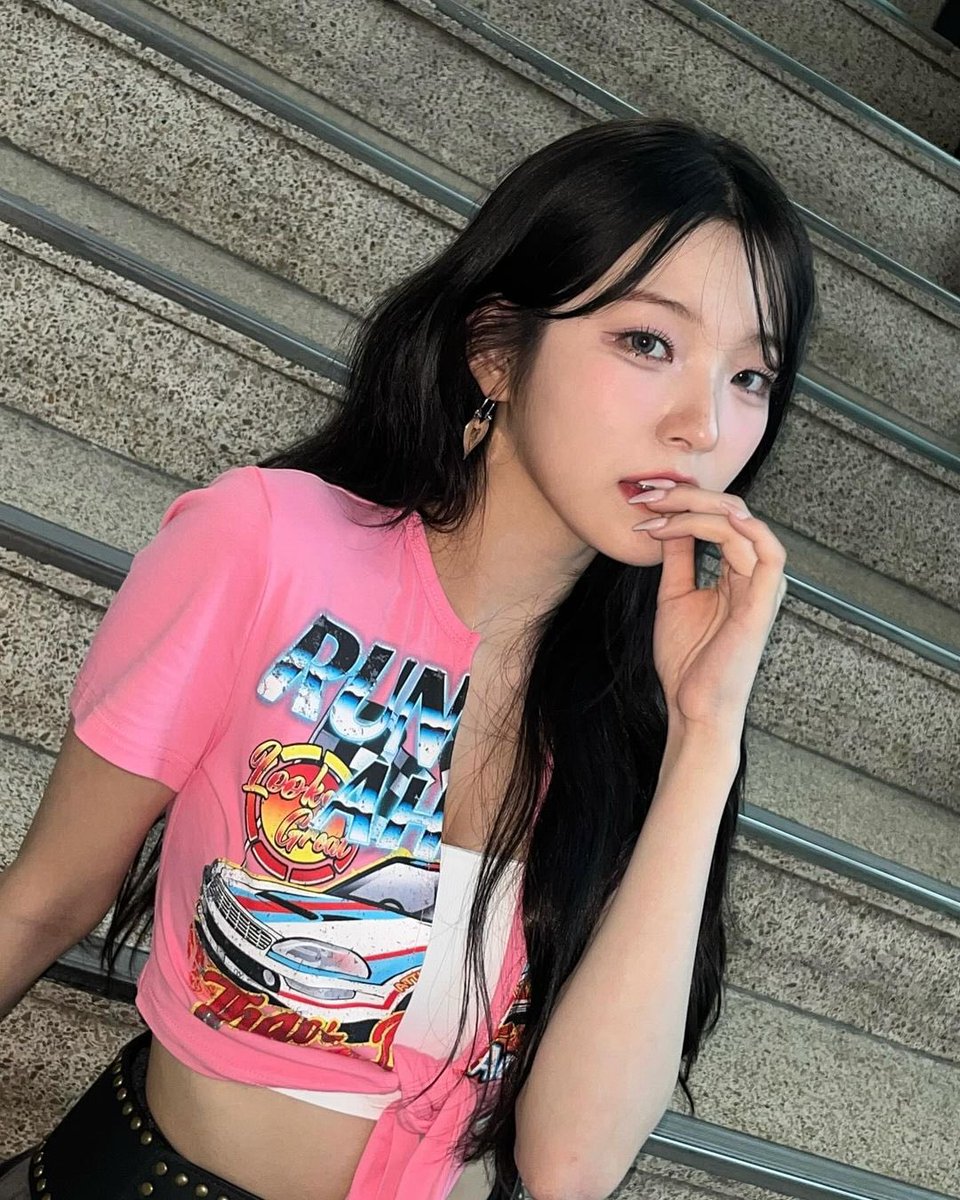 Resting my chin in quiet thought, I let the sunlight brush against my skin—lost in a daydream where the world seems softer and time slows just for me.