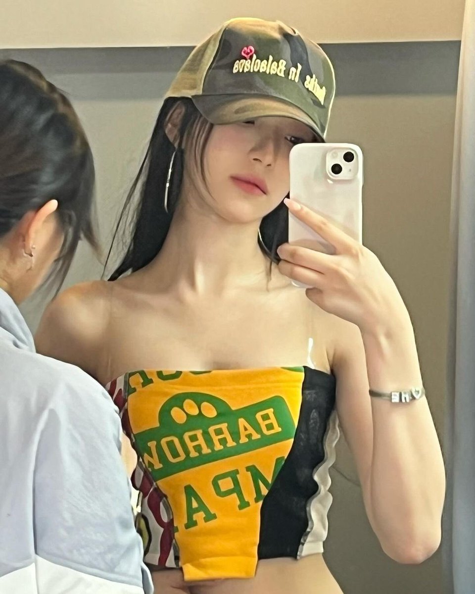 I glance at my reflection, a mix of quiet confidence and casual rebellion, the cap tilted just enough to mirror the mood of the day.