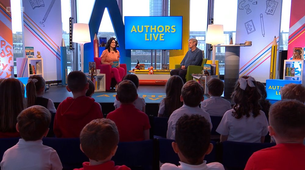 Scottish Book Trust (@scottishbktrust) on Twitter photo We are live on #BBCAuthorsLive with Axel Scheffler and <a href="/TVZaraJ/">Zara Janjua - Broadcast Multi-Hyphenate</a>! 👋
We are joined in the studio by pupils from <a href="/SteppsPrimary/">Stepps Primary</a>, and by over 40,000 pupils tuning in from classrooms and school halls across the UK.🤯
Happy Book Week Scotland to each and every one of you! 📚✨ We are live on #BBCAuthorsLive with Axel Scheffler and <a href="/TVZaraJ/">Zara Janjua - Broadcast Multi-Hyphenate</a>! 👋
We are joined in the studio by pupils from <a href="/SteppsPrimary/">Stepps Primary</a>, and by over 40,000 pupils tuning in from classrooms and school halls across the UK.🤯
Happy Book Week Scotland to each and every one of you! 📚✨