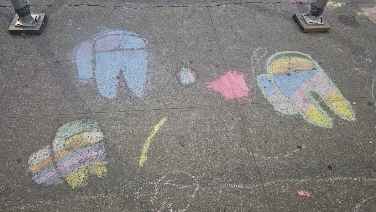 The kids at PS83 have been putting the Open Street on Rhinelander Ave into good use and leaving art for the public to enjoy.