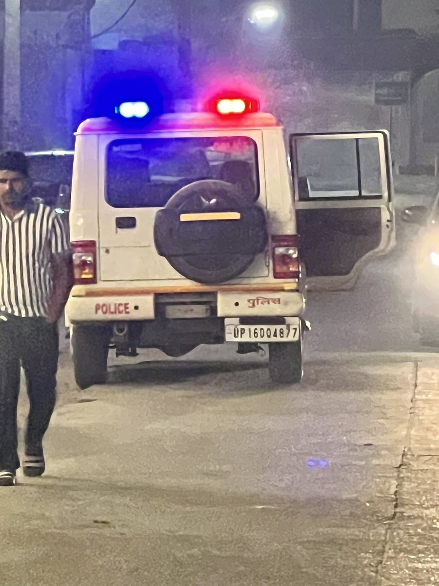 alpine_shek's tweet photo. Dear @Uppolice , the blue Volkswagen in the photo is my car, parked in the designated parking spot outside JS Banquet in Noida sector 132. 30 minutes after parking I get an e-challan and the police car was standing close by who didn’t bother to respond to my queries. Any help??? https://t.co/MqIDtflJh0