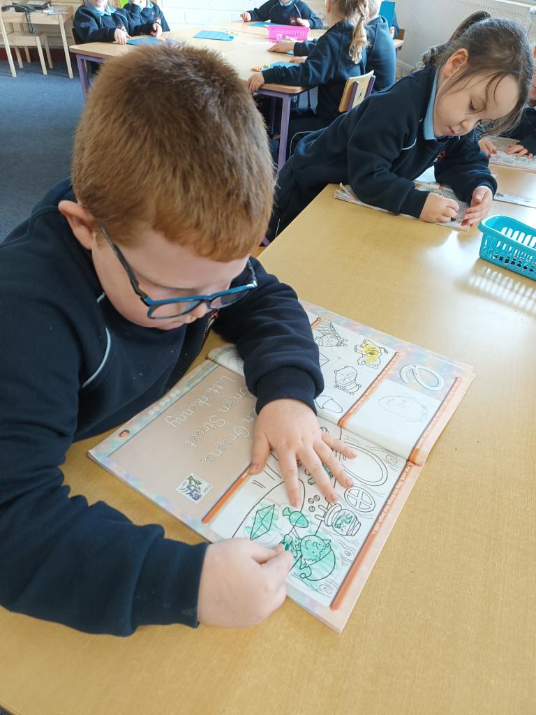 We worked hard at our Literacy Stations. Making words with magnetic letters, working on our phonics, letter formation and listening comprehension. <a href="/RathnureNS/">Rathnure NS</a>