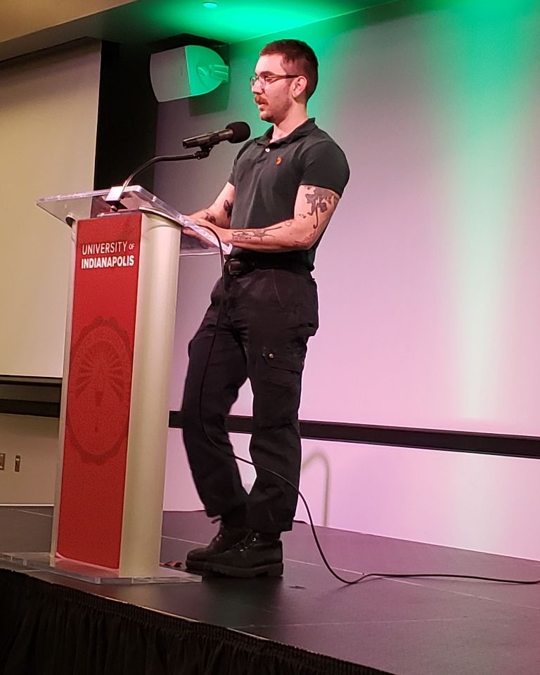 UIndy_English's tweet photo. Happening right now! The amazing Gina Chung, author of the books, Green Frog and Sea Change and introduced by @uindy student Ben Redar and Prof. Barney Haney, reads for this year's final #KelloggWritersSeries of 2024! #GoHounds #uindy #uindyKWS https://t.co/YYXD0UGpvs