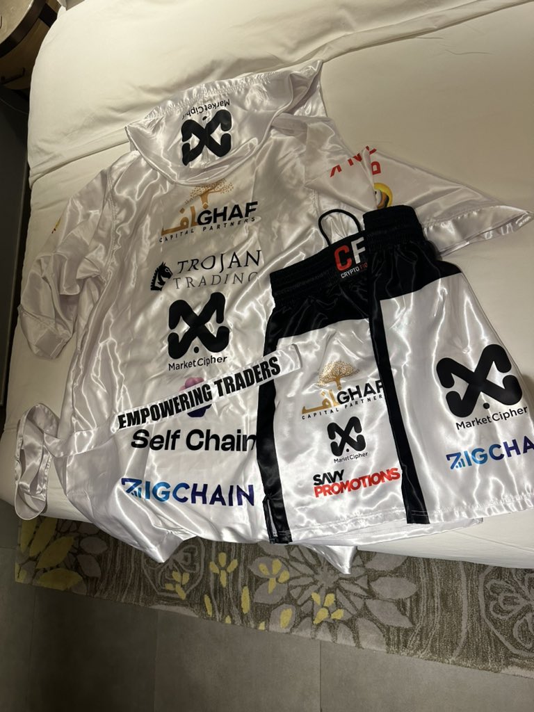 jchains's tweet image. All geared up and ready for @CryptoFightWeek! 🥊🔥

Huge shoutout to @MarketCipher1 and the legend himself @RealCryptoFace1 for the support. The MC logo is repping big time on the fight night kit!

Special mention to my corner guy @6am_Doug, who’s rocking the official Team…