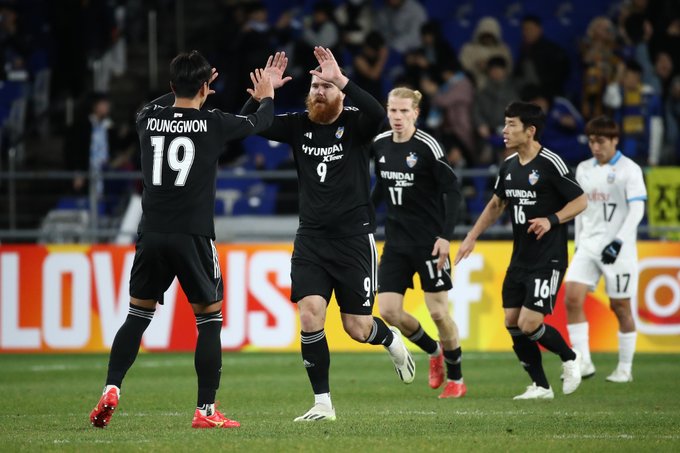 Ulsan HD players celebrate.