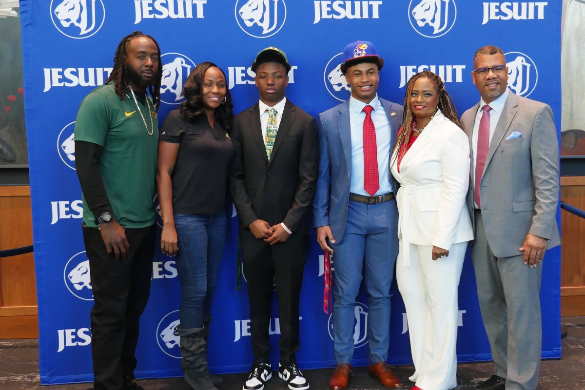 Jesuit celebrated National Signing Day for football this morning before Convocation inside the Shembekar Auditorium.

With family, teammates, coaches, and teachers on hand for the special occasion, S.J. Green '25 (North Dakota State) and Justin Thurman '25 (University of Kansas)