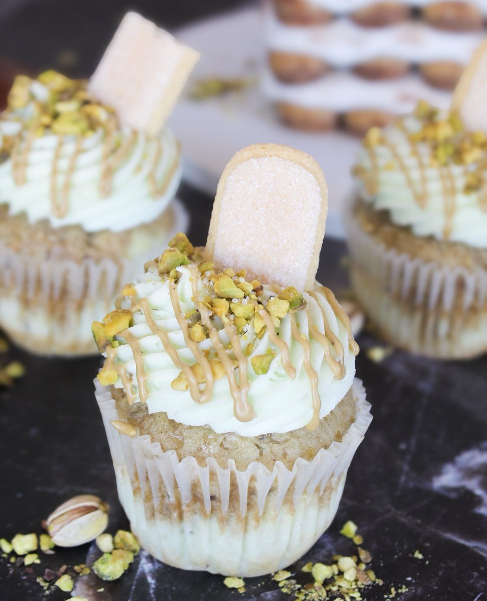 Welcome winter, and new cupcakes. Meet the Pistachio Tiramisu - tender pistachio cake and filling soaked with bold espresso and swirled with pistachio buttercream. A drizzle of pistachio butter and a ladyfinger on top make this seasonal sweet treat perfect for any occasion.