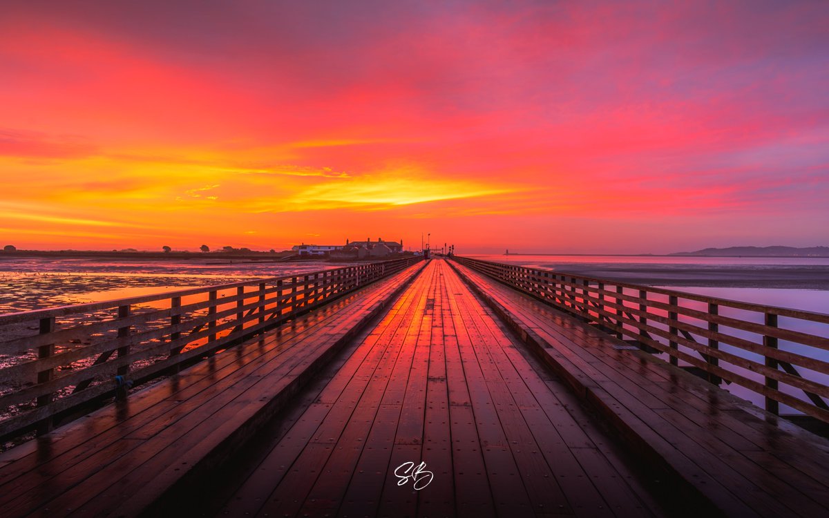Another of this morning's colourful sky over the Wooden Bridge at Clontarf.