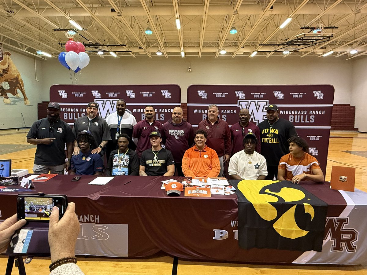 Coach Ross (@coachrosswrhs) on Twitter photo Congratulations to our 6️⃣ signees on signing their NIL’s this afternoon:
Bryce Randolph- Liberty
Mo Alexis- Livingstone College
Alex Condon- UNC-Pembroke
Gavin Blanchard- Clemson
Nathan McNeil- Iowa
Graceson Littleton- Texas
<a href="/wiregrassRanchH/">Wiregrass Ranch High</a> <a href="/WGRanchFootball/">Wiregrass Ranch High School Football</a> <a href="/hdcoach_mark/">Mark Kantor</a> Congratulations to our 6️⃣ signees on signing their NIL’s this afternoon:
Bryce Randolph- Liberty
Mo Alexis- Livingstone College
Alex Condon- UNC-Pembroke
Gavin Blanchard- Clemson
Nathan McNeil- Iowa
Graceson Littleton- Texas
<a href="/wiregrassRanchH/">Wiregrass Ranch High</a> <a href="/WGRanchFootball/">Wiregrass Ranch High School Football</a> <a href="/hdcoach_mark/">Mark Kantor</a>