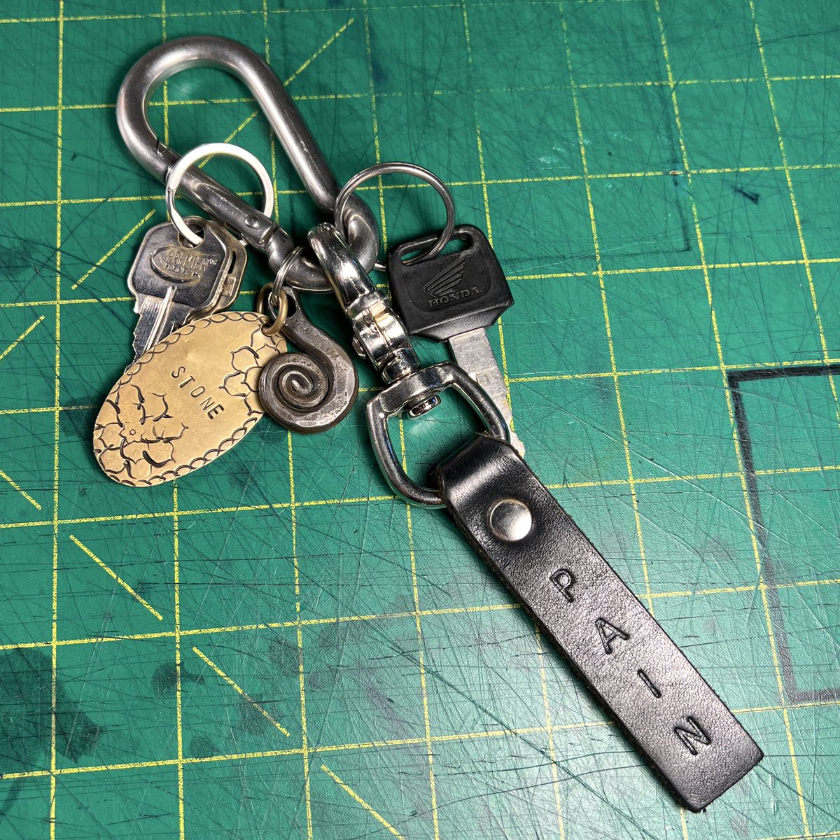 riverqueer's tweet photo. Here's one of these keychains after being worn for a year and a half, I think they get prettier as they age https://t.co/aoBcdtczuL