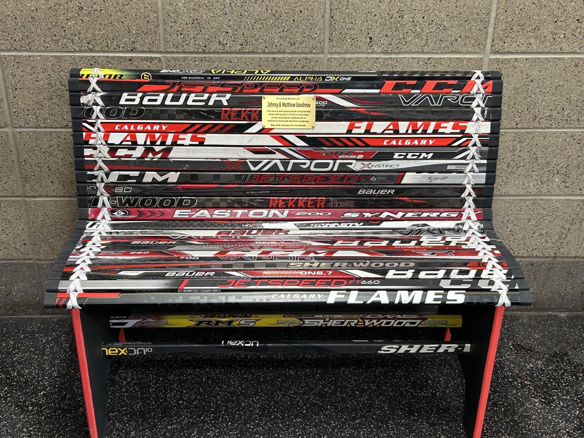 EricFrancis's tweet photo. Emotional unveiling for the Gaudreau family of the first bench made by 27 sticks from the memorial, dedicated to Johnny and Matthew’s memory. Made by a season ticket holder, the bench is at Flames Community Arenas. https://t.co/tdrVDJi7h7