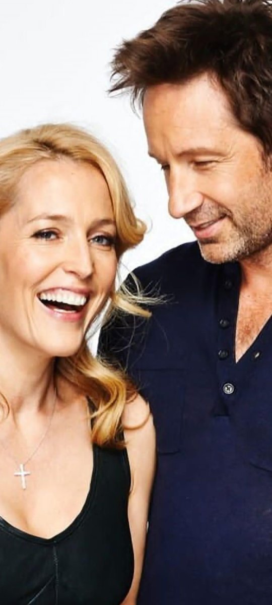 Always staring and smiling at her. #Gillovny