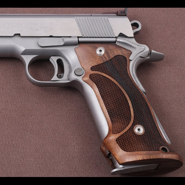 1911 walnut target grips 

Visit to benefit from 40 percent discount on all products.
gungripsusa.com