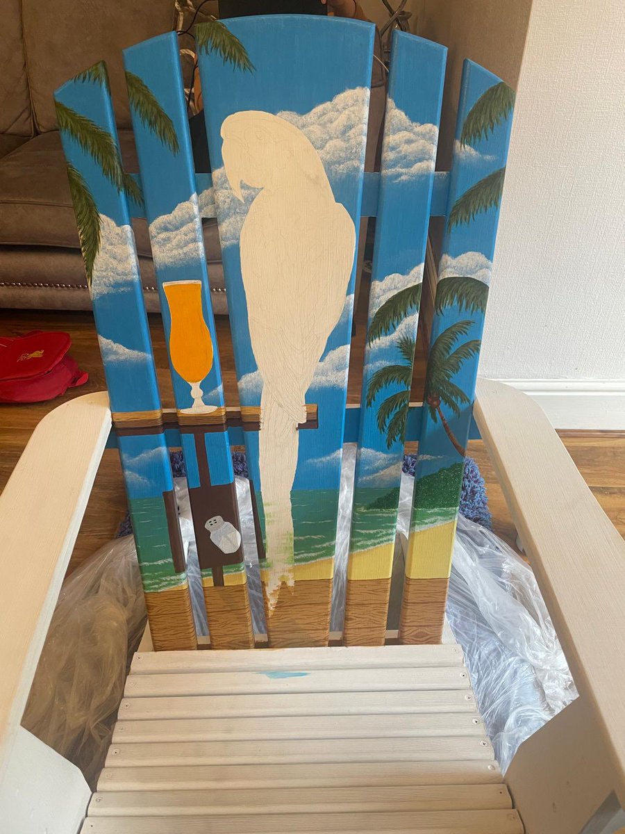 fazakerleyite's tweet photo. Made up with this for my 40th birthday. I saw something similar many years ago in a @Margaritaville and I commented I’d love to own one. My in-laws found a hand made version of the chair, together they stripped the varnish, sanded, primed, designed &amp; @Kirsty_art painted this https://t.co/8I4ffQApau