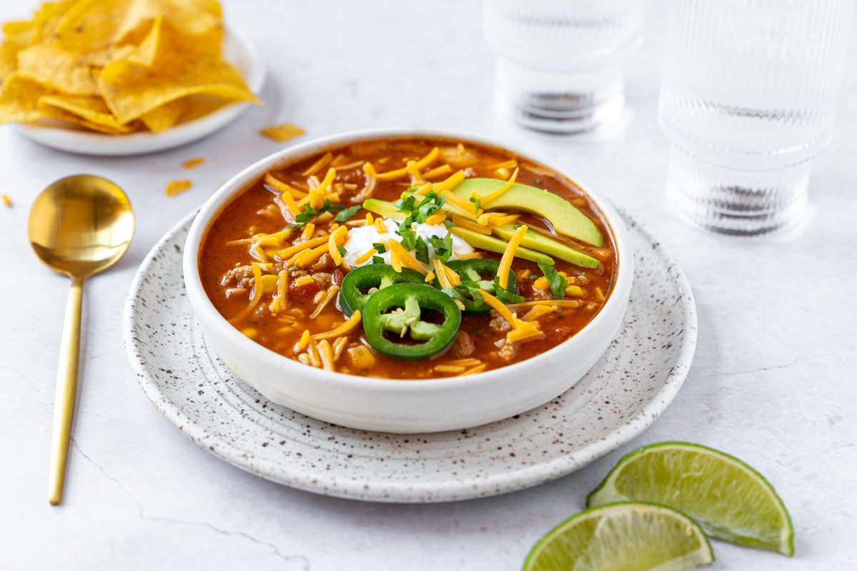 Baby, it's cold outside! Stay warm inside with your new favorite #comfortmeal. ☃️ See the link to learn how to make this #TacoSoup. 👉 bit.ly/48HelsQ