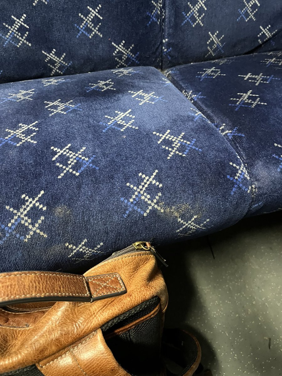 M67McG's tweet photo. @ScotRail carriage 77265. Got the 09:09 Balloch into Glasgow and sitting about the same seat area on the 22:40 home. 

A small thing lots will say but it’s disgusting, will I shall send my next dry cleaning bill your way? https://t.co/bIOyEZ2CAX