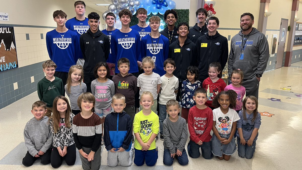 Varsity boys reading to the students at Austin Elementary <a href="/whsrooathletics/">Weatherford Athletics</a> <a href="/WeatherfordISD/">Weatherford ISD</a>
