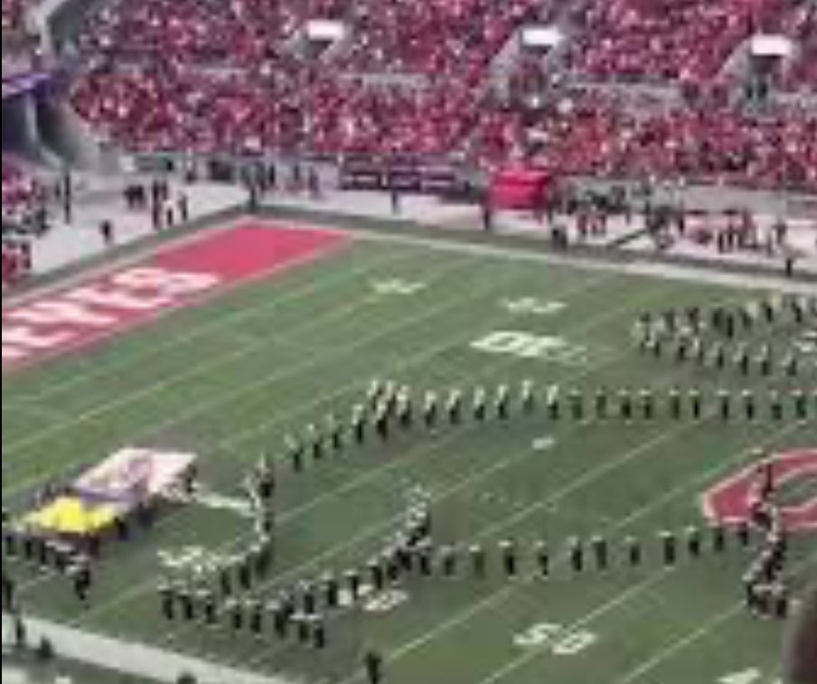 SoSaysCed's tweet photo. @righttimebomani @bomani_jones OSU Band formed a bear pooping on Michigan flag in their house so yea a week ago, so yea. Sho nuff they were going to “plant the flag” after breaking their hearts in their house. Because like you say, “Disrespect will not be tolerated.” https://t.co/g3NgQdiDv7