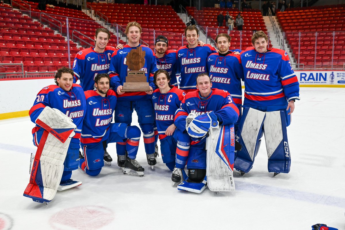 RiverHawkHockey's tweet photo. Hoisted some gold of our own at the Olympic Center🥇

#UnitedInBlue | #HockeyEast https://t.co/c0X1WLK29A