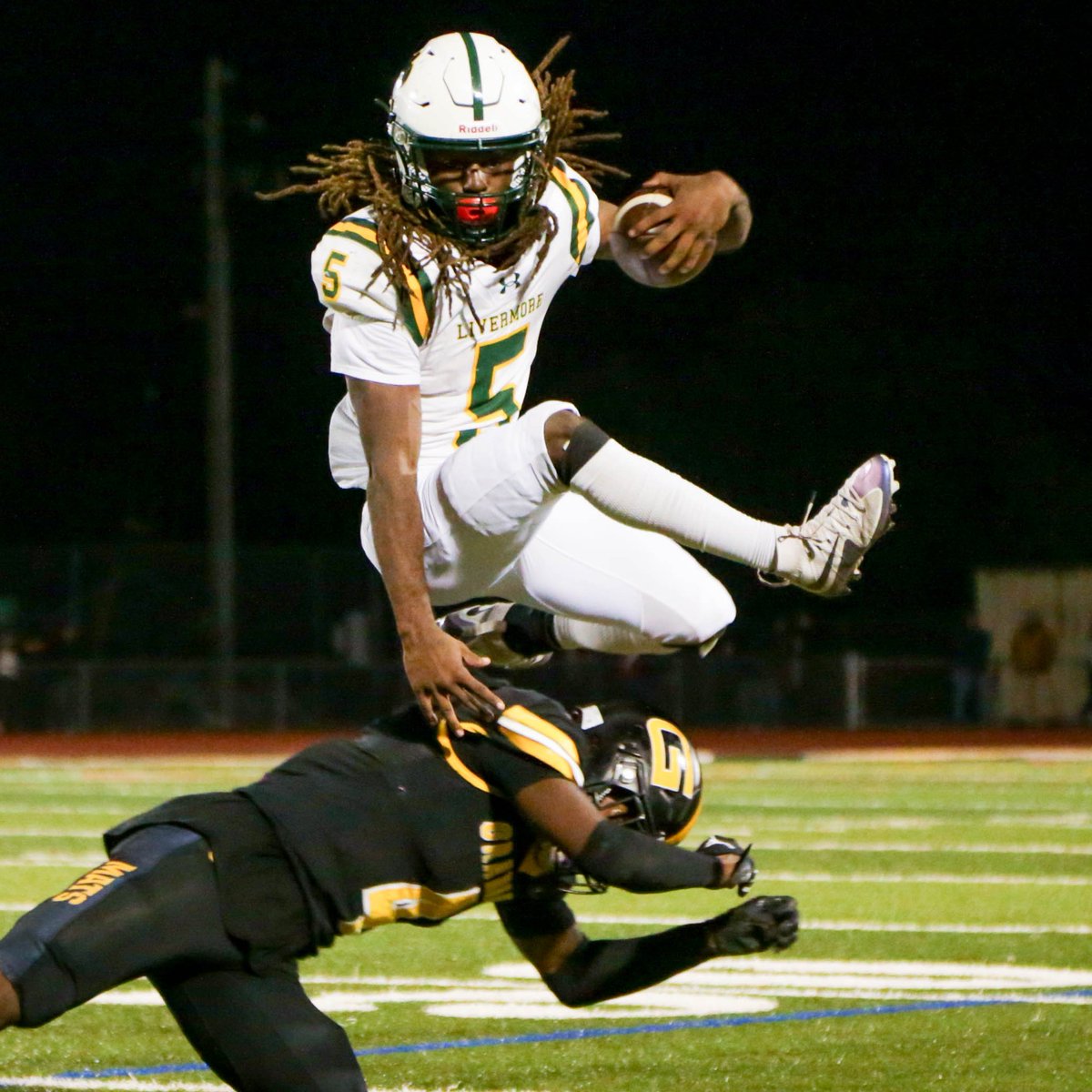 From week 1 of the NCS playoffs:  LIvermore running back Kamarri Robinson (@KamarriRobinso) jumps over a Granada defender and runs for 15 yards in the second half of a first round playoff game. 

I think the play got called back bc of a penalty, but that doesn't matter.