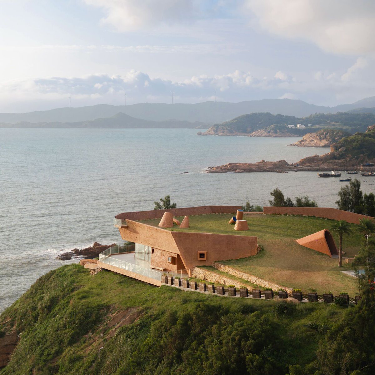 Archello's tweet image. Inspired by coastal reefs and sea caves, Hidden Underground and Viewing the Vast Sea by 3andwich Design blends architecture with nature. 
buff.ly/4eZsrI3

#SustainableDesign #OrganicArchitecture #NatureInspired