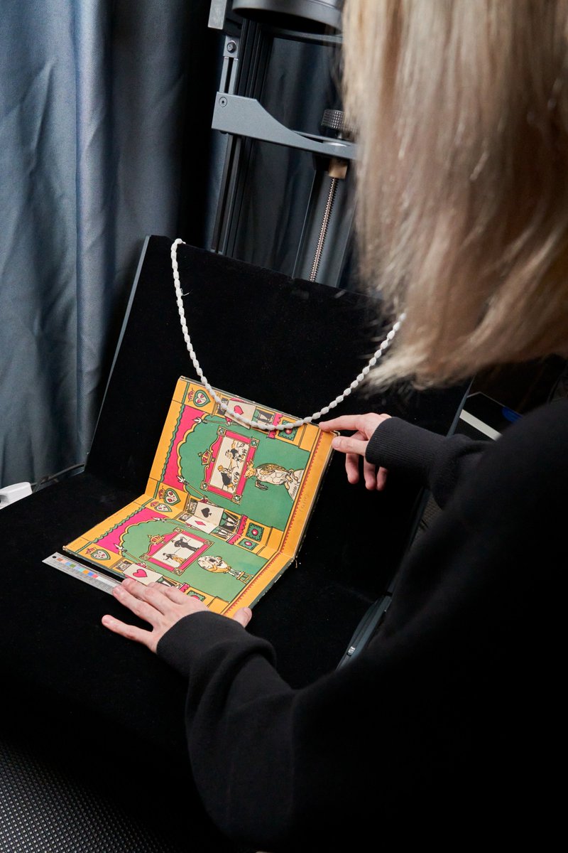 Introducing the newest project photographer in the imaging team, Holly (<a href="/hollystaniforth/">holly</a>). She is pictured here working on a cradle for the X stands for nothing project. This online exhibition will be showcasing material from the David Blamires’ collection of alphabet books.