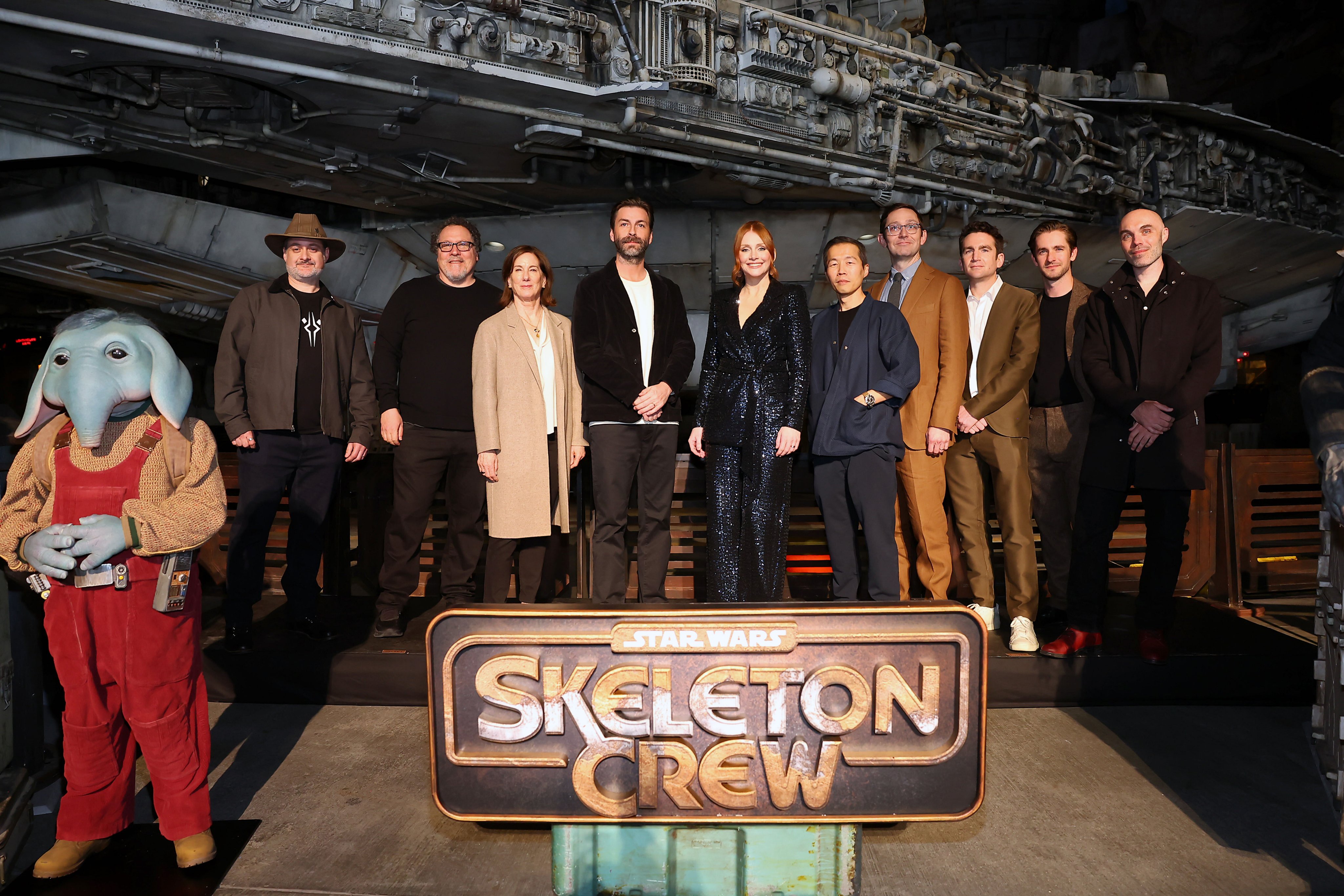 (L-R) Dave Filoni, Jon Favreau, Kathleen Kennedy, Jon Watts, Bryce Dallas Howard, Lee Isaac Chung, Christopher Ford, Jake Schreier, Chris Buongiorno, and David Lowery attend the Star Wars: Skeleton Crew launch event at Star Wars: Galaxy’s Edge at Disneyland Resort.