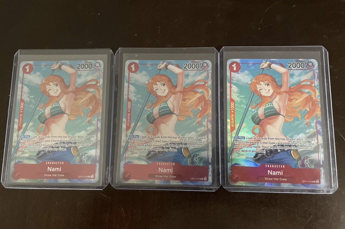 a lot of people my age are getting married and buying homes while I finally got all the versions of alt art nami from OP01 with and without the errata’d text