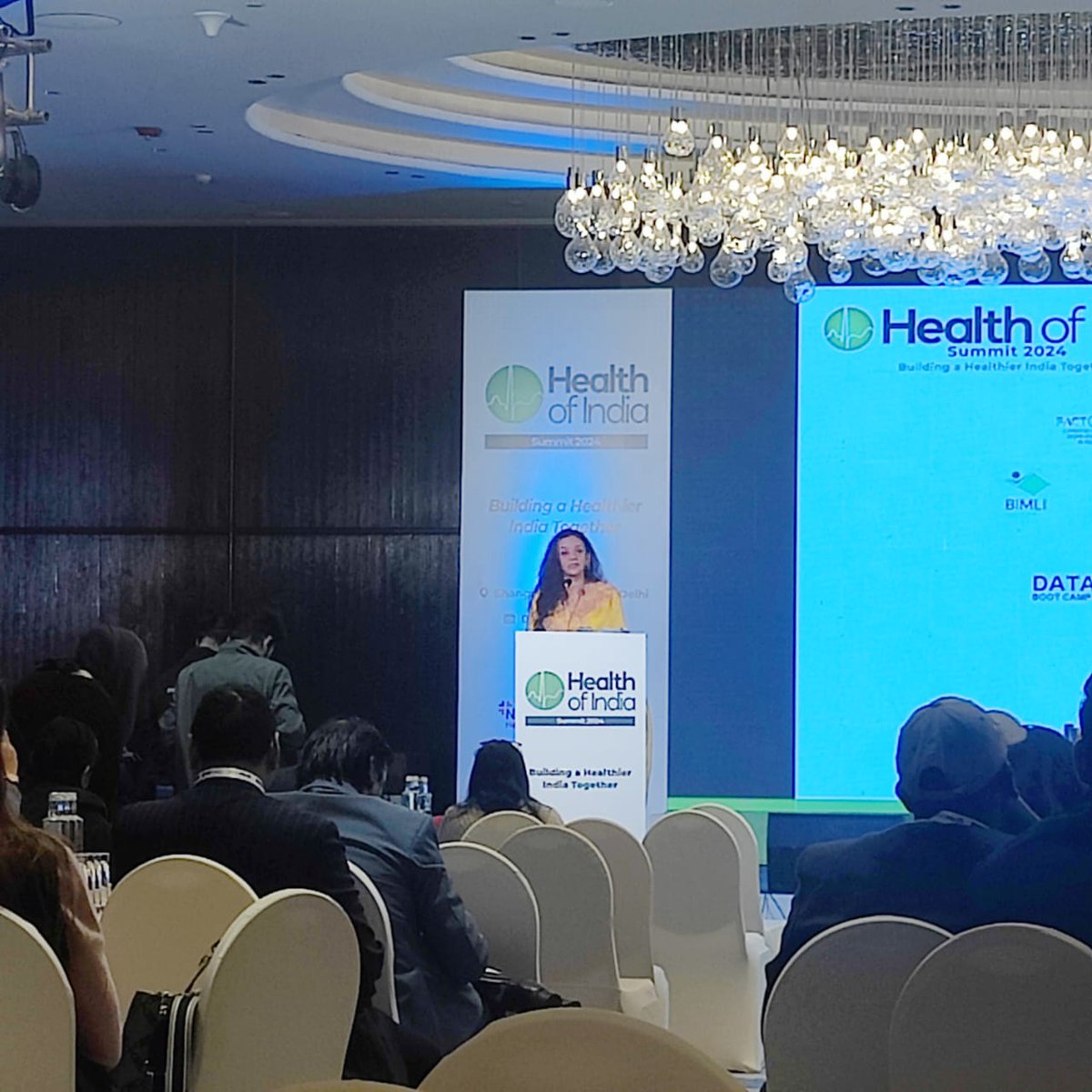 FirstCheck_In's tweet photo. Surbhi Pandit Nangla, Vice President @data_LEADS  delivers her welcome address at the Health of India summit organized by @firstcheck_intl in New Delhi. 
#HealthofIndia #AI #Health https://t.co/3AcUxTnhaY