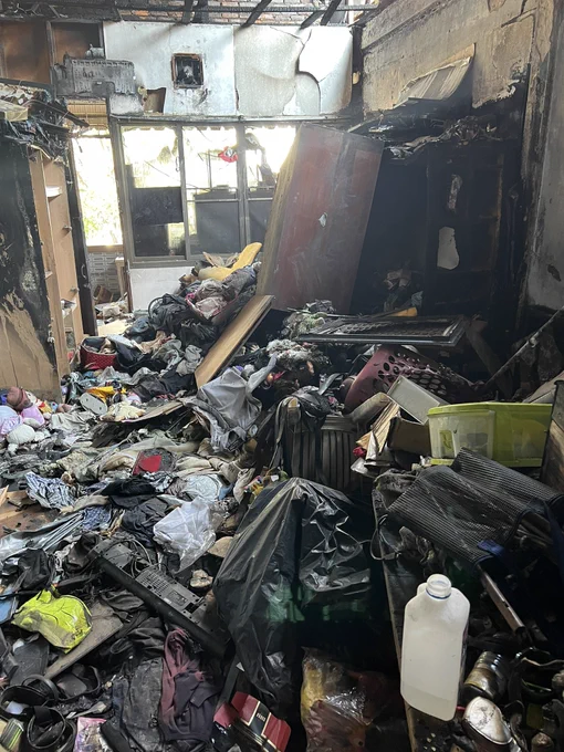 Exploring an abandoned shipping officeOffice itself closed down 10 years ago. But it was furthered damaged by a fire that ravaged this 3 stories building. 