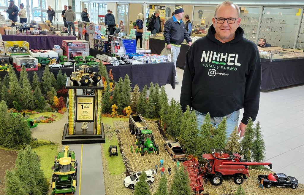 realagriculture's tweet photo. Model farm creator, Robin Nikkel from B.C. wins again at world’s largest #farmtoy contest: https://t.co/nv2PsmsOE9

#cdnag #ontag #westcdnag #modelfarm https://t.co/4w4dVgvg77