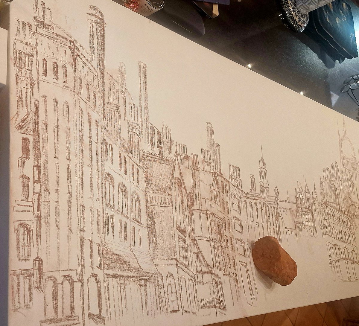 Drawing Victorian London, using a chunk of London brick.