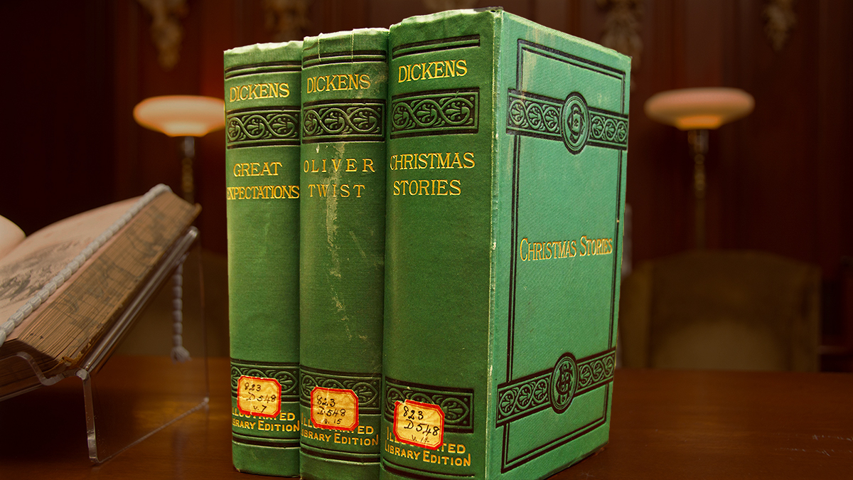BCLegislature's tweet photo. DYK Charles Dickens was once a parliamentary reporter? Explore some first edition novels and interesting history with the #BCLeg Treasures from the Library Vault program in our online session Dec 13 at 2pm. Register at https://t.co/c7IlOCfFxp. https://t.co/MuEr0HjcmF