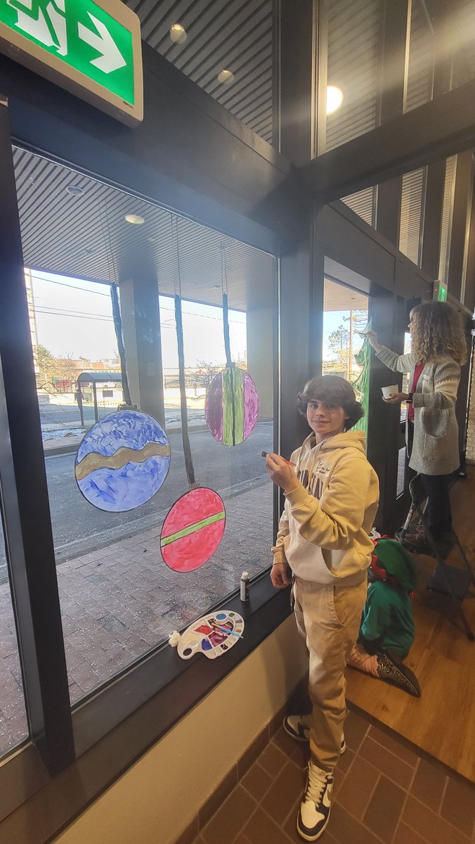 SJBKE_School's tweet photo. Thanks to Caleb and Neveah (Gr.8) for representing SJBKE @PALSpartners tree and window decorating event held at the JDI Building today- they did a great job along with their fellow colleagues- starting to look a lot like Christmas! Thank you, PALS!   #awesome #bettertogether https://t.co/4NWo6T4om7