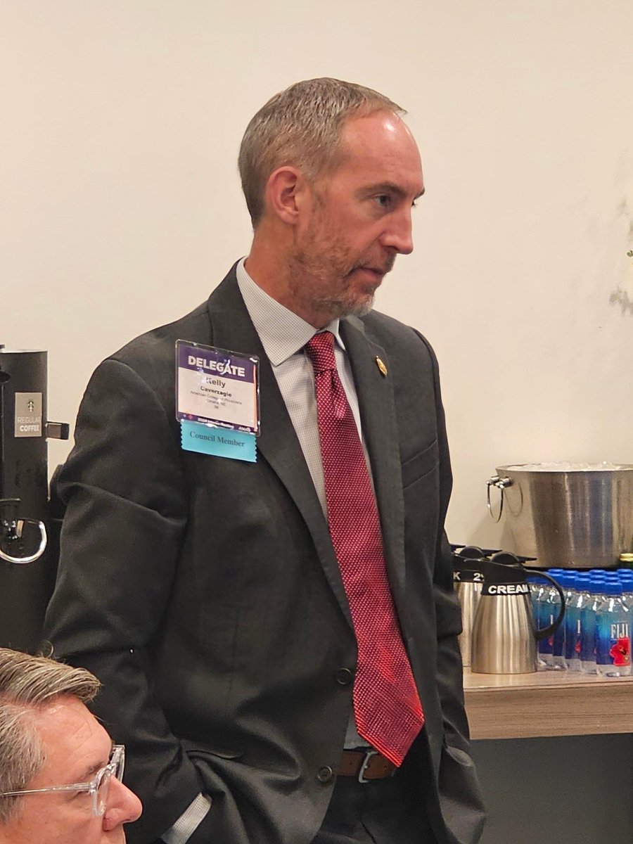 Dr. David Ingvoldstad, NMA President; Dr. Robert Wergin, NMA President-Elect and AMA Delegate; and Dr. Kelly Caverzagie, AMA Alternate Delegate, actively engaged in discussions with their North Central Medical Caucus colleagues at the 2024 AMA Interim Meeting.