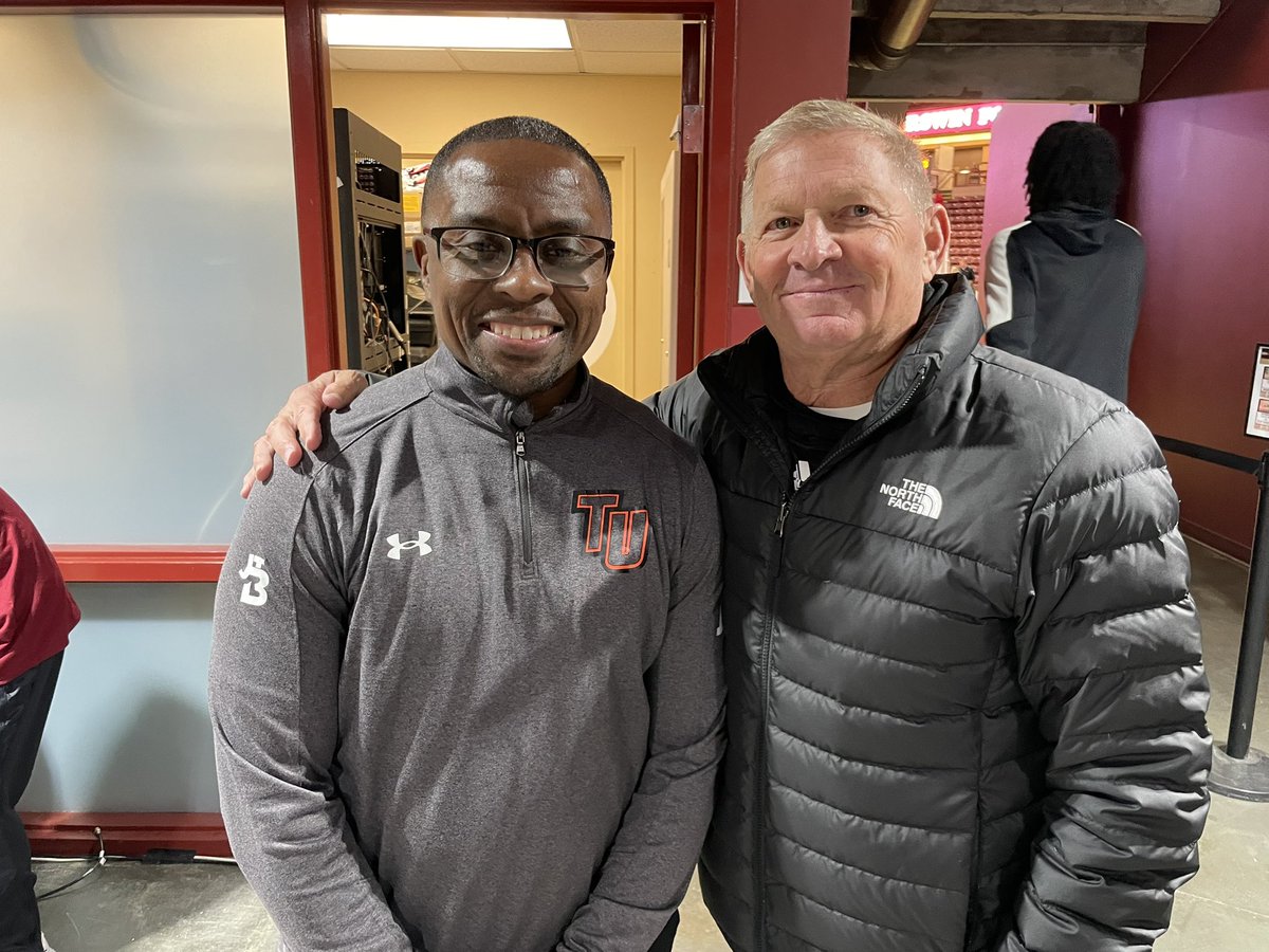 .<a href="/CoachJTBurton/">JT Burton</a> with former TU head coach Duggar Baucom at tonight’s exhibition game in Charleston. Each have led the Pioneers to the NCAA Tournament with the Black &amp; Orange #PioneerUP