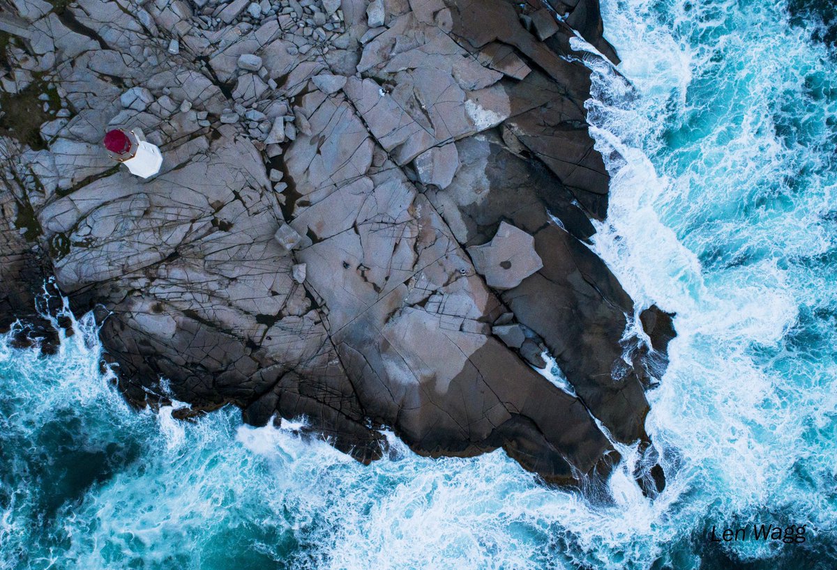 View from the top, Peggy’s Point lighthouse, Peggy’s Cove, Nova Scotia  . Imagine the noise when the granite cracked, all these fissures. #novascotia #peggyscove #ExploreCanada #hfxnoise
